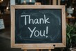 © AkuAku - Blank chalkboard sign displaying a gratitude message outdoors