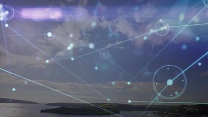 Wall Mural - animation of network of connections over green countryside and blue sky with clouds