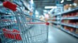 © Bang - Shopping cart in a blurry supermarket aisle