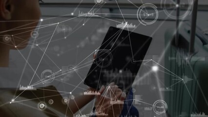 Wall Mural - animation of network of connections over caucasian businesswoman using tablet