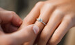 © Daniel - Man putting on girl finger engagement ring