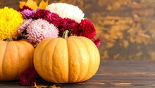 Two Pumpkins And Yellow Mums Free Stock Photo - Public Domain Pictures