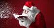 © Pixel-Shot - Portrait of Santa Claus with book blowing snow on color background