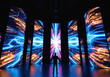 © remake - Person silhouette stands before immersive digital display installation with colorful light projections. Interactive multimedia exhibition features dynamic screens, futuristic technology environment.