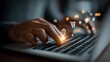 © Meera Graphic  - Person's hands typing on laptop with shopping icons appearing.