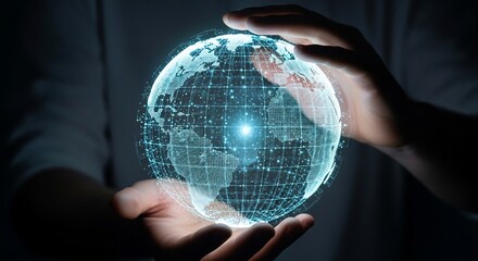 Person holding a glowing digital globe representing global network and technology.