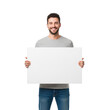 © Noah - Young caucasian man, short dark curly hair, beard, grey t-shirt, blue jeans, cheerful smile. Holding blank white sign in transparent studio background with copy space. Concept for commercial