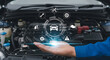 © Meiza - Car Maintenance Concept Automotive Technology with Hand and Engine