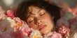 © horizon - Beautiful young woman with natural makeup lies peacefully on a bed covered in a sea of fresh pink and white roses, bathed in soft morning sunlight.