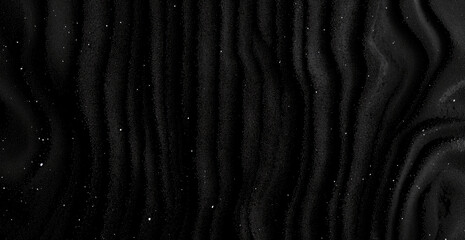 Abstract black wavy background resembling dark matter with glitter