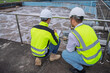 © reewungjunerr - Environmental engineers work at wastewater treatment plants,Water supply engineering working at Water recycling plant for reuse