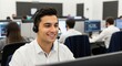 © mohammed - Friendly male customer service representative wearing a headset and smiling while providing professional user assistance in a modern call center.