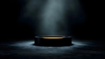 Wall Mural - Futuristic black platform with a glowing orange ring stands under a dramatic spotlight in a dark atmospheric studio setting
