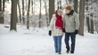 © Tashik - Happy senior couple walking arm in arm through a snowy winter forest, enjoying love, togetherness, and nature during a romantic winter walk in the woods