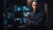 © YM Creative Studio - Professional Security Officer Standing with Crossed Arms in Control Room with Surveillance Monitor Screens