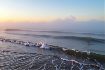 Wall Mural - Misty morning fog rolling over gentle sea ripples, creating an ethereal, serene coastal scene, light, ocean