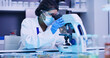 © peopleimages.com - Woman, scientist and check with microscope in lab for research, medical experiment and testing dna. Female person, face mask and sample analysis, genetic engineering and studying virus for biotech