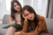 © Odua Images - Two women engage in a deeply heartfelt and meaningful conversation in the warmth of their home