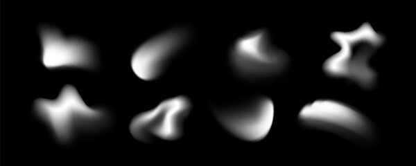 Blur shape blob collection with soft white gradient forms on black background for abstract design and overlay effects. Smooth organic modern elements with diffused blurry edges and glowing spots