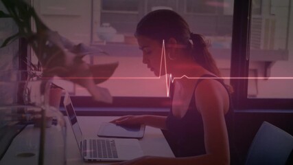 Wall Mural - animation of lifeline over women using laptop