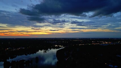 Sticker - A Beautiful and Tranquil Scene Of the Evening Twilight Sky Over a River In Tampa City, Florida - Drone Shot Tracking to the Left