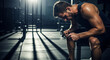 © Viktoriia - Young caucasian man sweating after intense workout at gym. Fitness and sport concept. Athletic lifestyle.