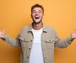 © Imnot99 - A man with a joyful expression, arms outstretched, stands against a vibrant, solid orange background, showcasing a friendly and approachable demeanor.