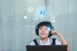 © eakgrungenerd - Smart Asian child Point finger at head using AI technology, wearing headphones, learning with artificial intelligence assistant at home, symbolizing futuristic education and digital innovation.