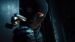 © YM Creative Studio - Masked burglar using lockpicking tools to break into property during nighttime criminal activity scene