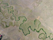 © Turkey Photo - High-angle aerial panoramic view of natural winding meanders and a highland lake in Persembe Plateau, Ordu, Turkey. Unique green valley with river patterns and traditional rural settlements.