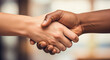 © Younas khan  - Two hands of different colors shaking hands, tolerance and respect.