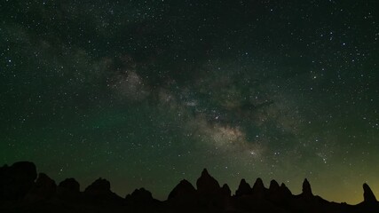 Wall Mural - Airglow and Milky Way Galaxy Over Trona Pinnacles 24mm Tilt Down Death Valley Region California USA Time Lapse