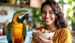 © Gogo - A beautiful person with long hair smiles while holding a bowl of granola with a colorful parrot