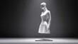 © Yusuf - White mannequin form in a dress under spotlight