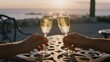 © fun - During the vacation, two people clink champagne glasses outdoors and enjoy relaxation and comfort in the beautiful scenery.