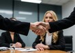 © Abdullah - Detailed Close-Up of Two Women’s Handshake in Boardroom with Cinematic Light