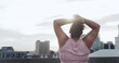 © peopleimages.com - Fitness, tired and back of plus size woman in city for workout break, health and runner fatigue. Exhausted, weight loss and space with person outdoor for resting, exercise stop and cardio challenge