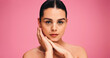 © peopleimages.com - Skincare, beauty and portrait of woman in studio with natural, cosmetics or facial glow. Serious, mockup space and female person from Brazil with face dermatology for wellness by pink background.