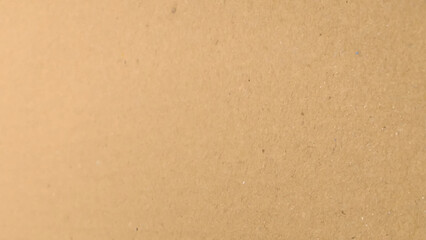 Background of brown kraft paper or cardboard texture. Brown recycled paper texture background.