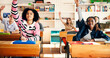 © peopleimages.com - Question, class and students in classroom at high school with learning, education or participation in lesson. Teen, group and people raising hands for knowledge, academic development and interaction
