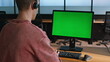© stockbusters - Operator using chromakey computer at workplace closeup. Green screen device