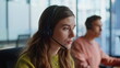 © stockbusters - Thoughtful support agent listening customer solving request at workplace closeup