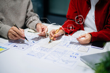 Wall Mural - UX graphic designer planning application process development prototype wireframe for web smart phone. Creative digital development agency.