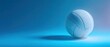© Daria  - The volleyball on a smooth blue background showcasing elegance and simplicity.