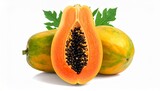 Fresh papaya cut open with orange flesh black seeds tropical sweet juicy fruit isolated on white background
