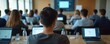 © miss irine - Employees attend cybersecurity workshop focused on data protection, network security. Attendees learn about safeguarding digital information, online threats in modern training setting with laptops,