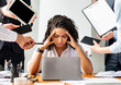 © Prostock-studio - Multitasking And Overworking. Stressed Businesswoman At Laptop Touching Head Tired Of Work Tasks Sitting In Modern Office.
