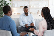 © Prostock-studio - Professional Marriage Counselor Listening Problems Of Black Millennial Couple During Therapy Session At His Office, Young African Spouses Having Relationship Crisis, Selective Focus At Psychologist