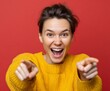 © Imnot99 - A woman in a vibrant mustard yellow sweater directs a joyful gaze outward, pointing directly at the viewer against a bold crimson backdrop.