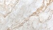 © Studicon - The image shows a detailed close-up of white marble, featuring a pattern of thin brown veins that create a natural, elegant design.